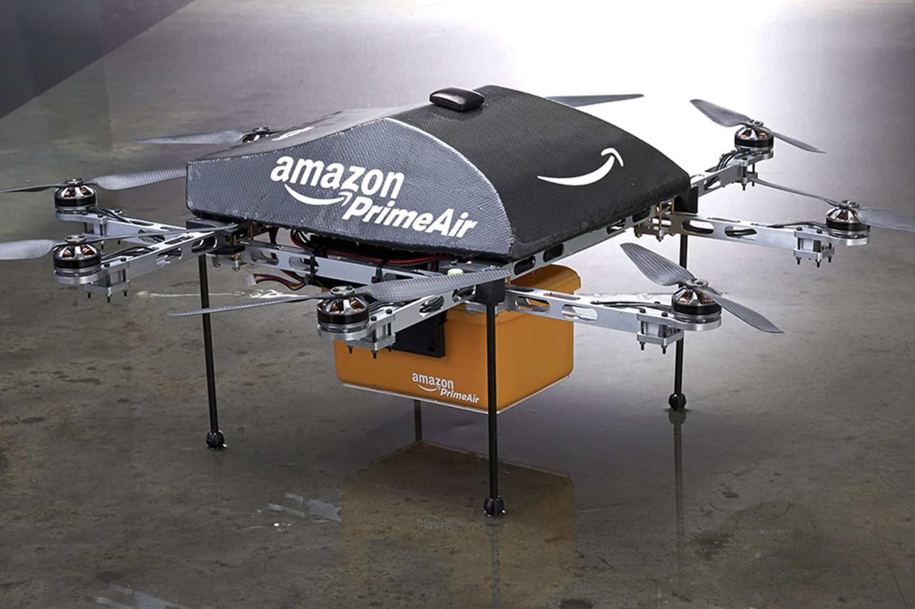 Amazon drone delivery cnn picking package drones dropping gonna sky start would work warehouse shows video story